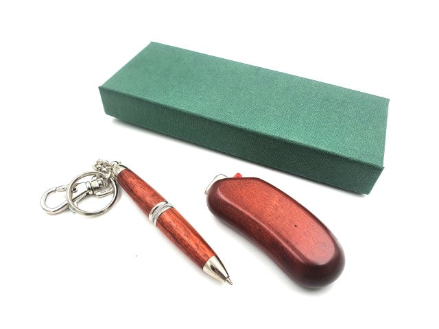 Lighter and pen in a cardboard box G069C