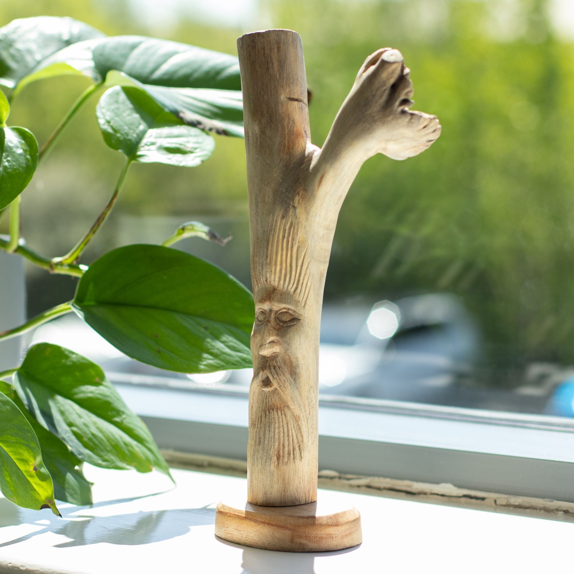 Hand-Carved Green Man Figurines from Parasitic Wood
