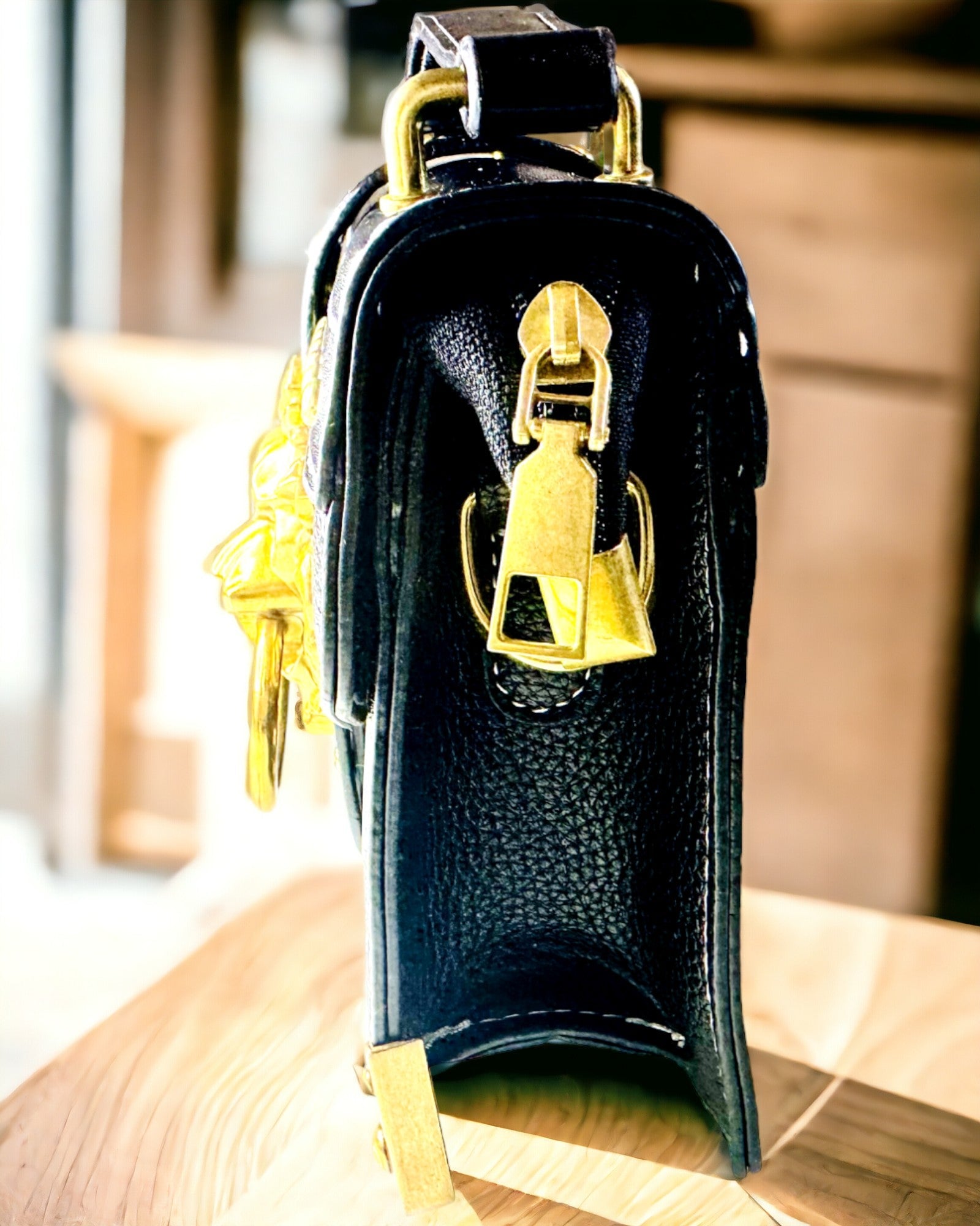 Fashionable Square Shoulder Bag with Lion Accent - color black