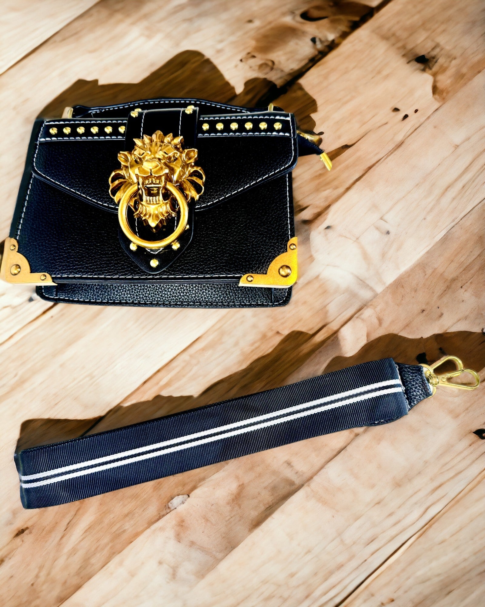 Fashionable Square Shoulder Bag with Lion Accent - color black