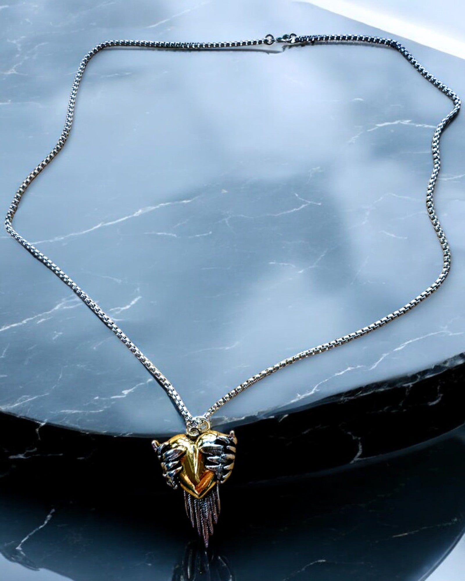 "Heartpiercer Amulet – Dark Wings of Love", personalization option with engraving for a gift.        4o
