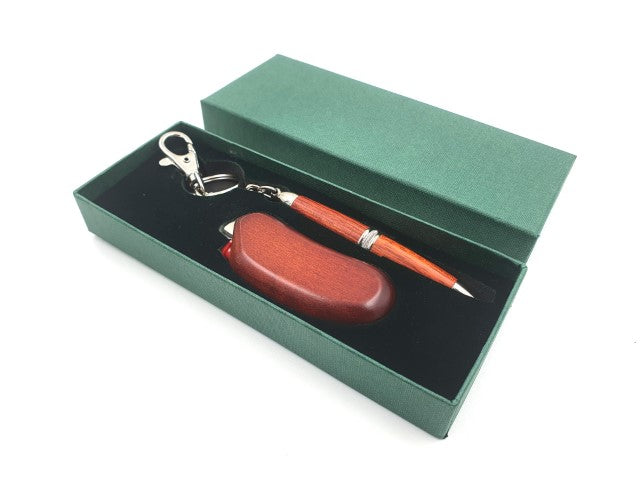 Lighter and pen in a cardboard box G069C