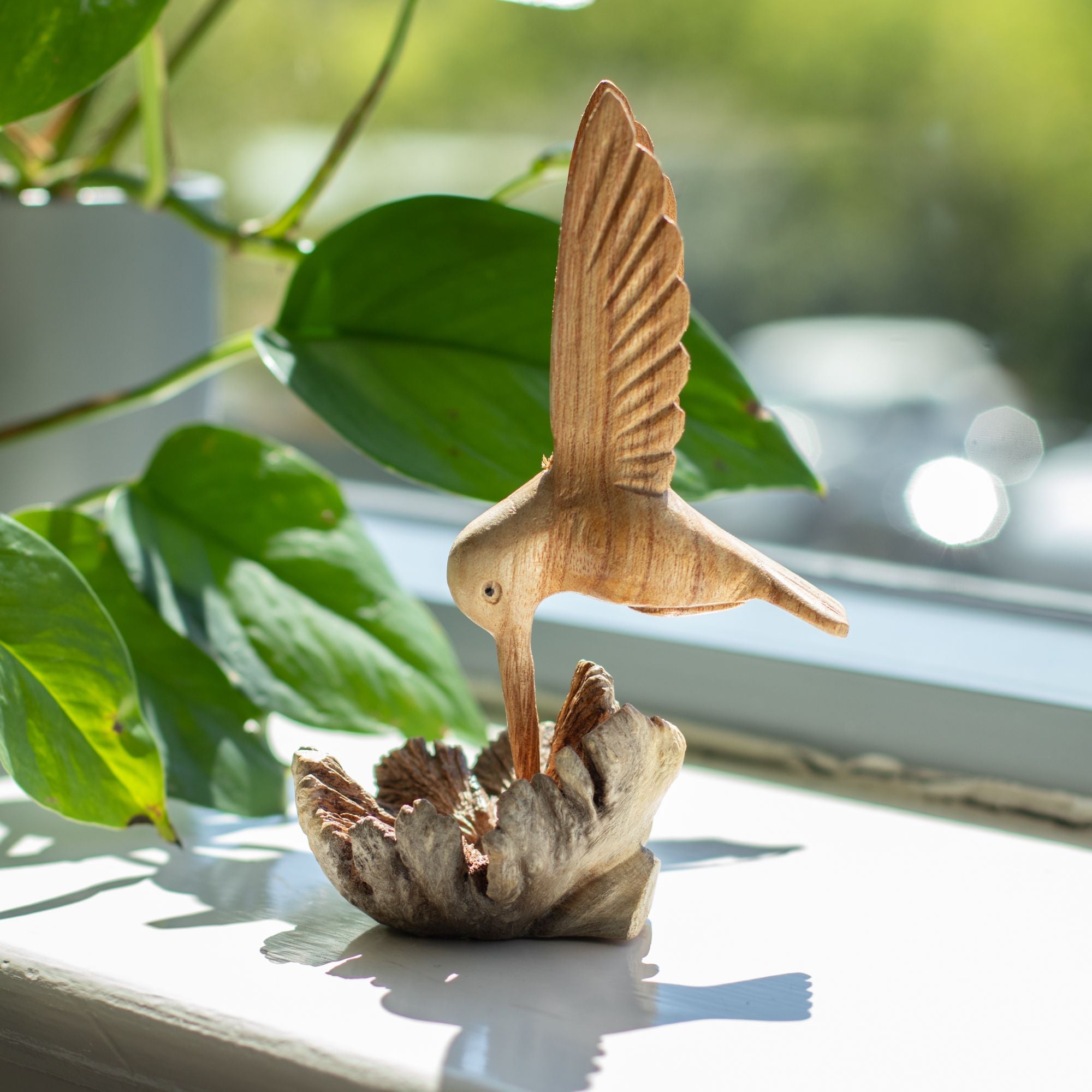 Handmade Sculpture of a Hummingbird Drinking Nectar from a Tree Burl