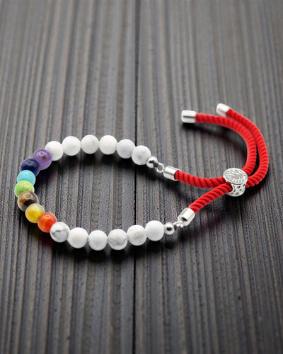 Royal Harmony Chakra – Bracelet with White Howlite and 925 Silver on a Red Cord