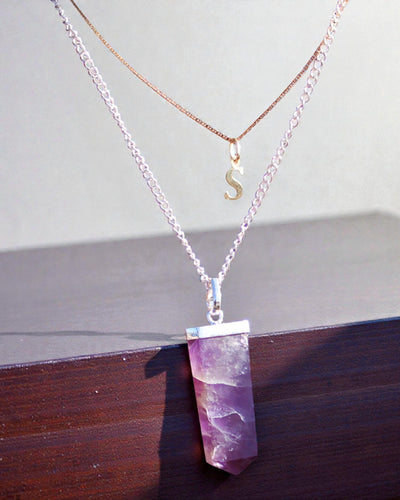 Crystal Ray – Flat Pendant Made of Rock Crystal in Crystal Cut