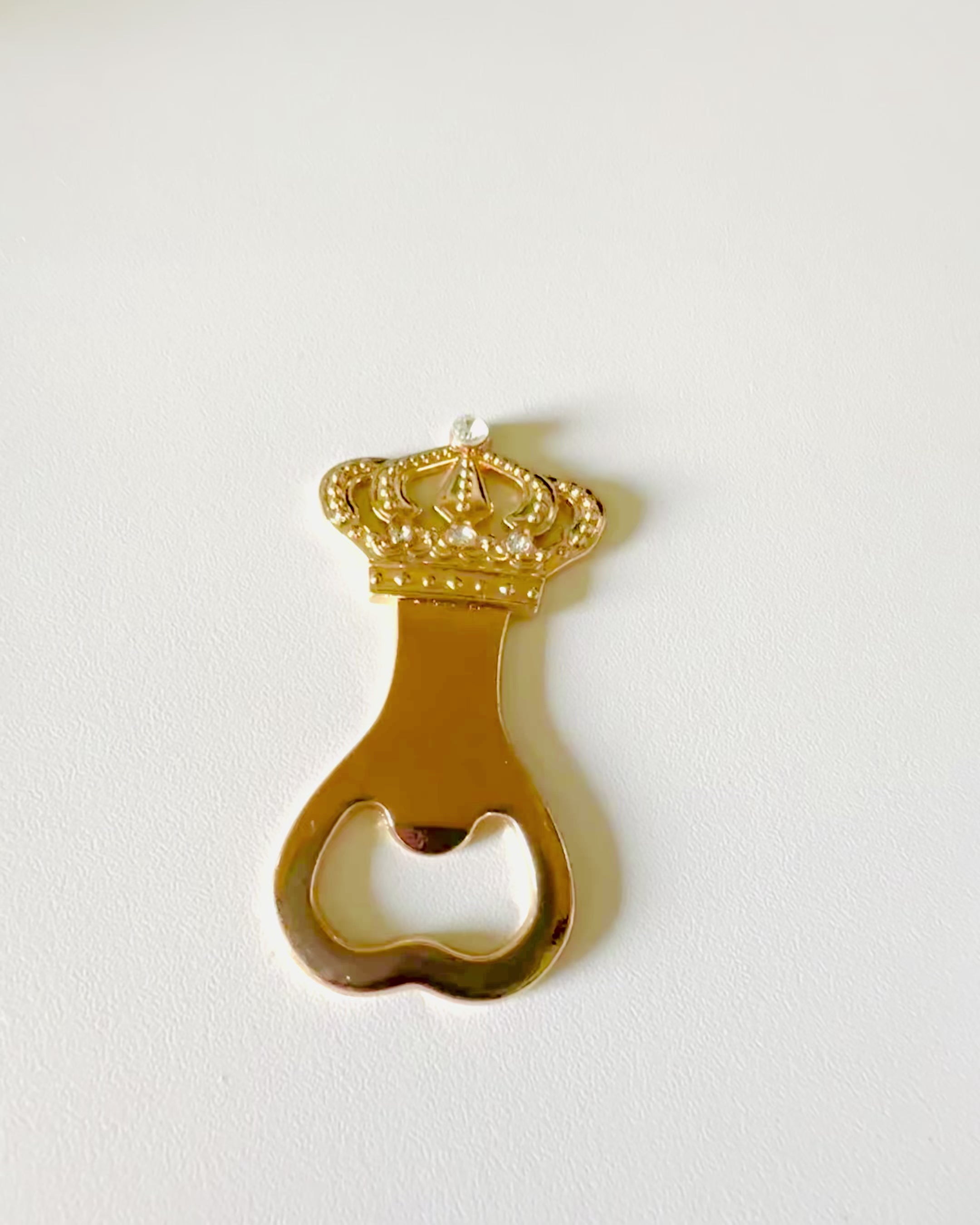 Golden "King's Crown" bottle opener, customizable with engraving